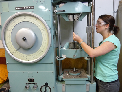 A picture containing person, device, millerDescription automatically generated